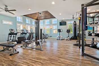 24-Hour health hub fitness center with cardio and free weights