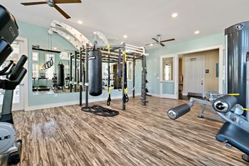 24-Hour health hub fitness center with cardio and free weights