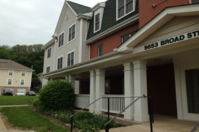 Pittsburgh apartment for rent - a building with a porch and a sign for broad street