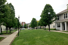Pittsburgh apartment for rent - a green lawn in front of a row of houses