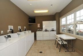 Ft. Mitchell townhouse for rent - a kitchen with a white counter and a table
