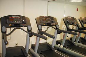 New Brunswick apartment for rent - the gym has several machines in the new gymnasium