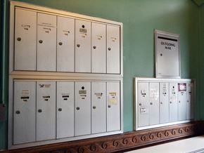 Worcester apartment for rent - a bunch of lockers and a machine in a room