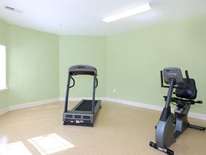 Durham apartment for rent - a home gym with a treadmill and exercise equipment