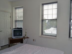 New Haven apartment for rent - a bedroom with a bed and a television on a table