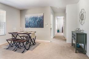 Akron apartment for rent - A dining room with a table and chairs.