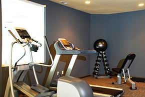 Federal Way apartment for rent - A gym with a treadmill, exercise bike, and a ball.