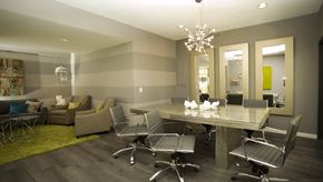Davis apartment for rent - A conference room with a long table and chairs.