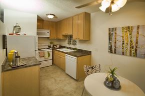 Davis apartment for rent - A kitchen with a table and chairs.