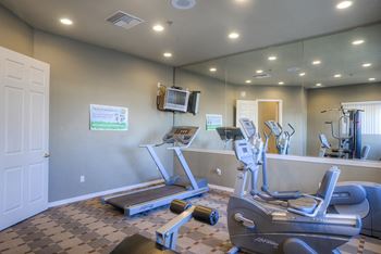 A gym with treadmills