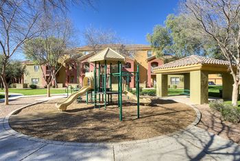 A playground with a yellow slide