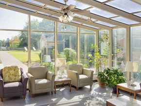 West Roxbury apartment for rent - a conservatory with chairs and a ceiling fan