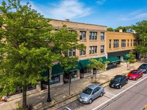 Evanston apartment for rent - an aerial view of a street with cars and a building