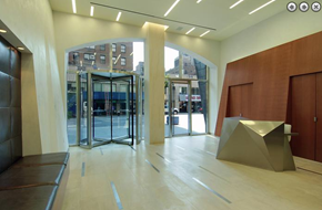 New York apartment for rent - a lobby with a reception desk and a glass door