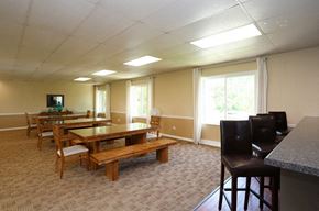 Glen Ellyn apartment for rent - a dining room with a table and chairs