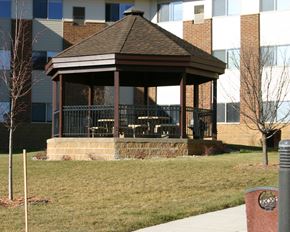 St. Peter apartment for rent - a gazebo in front of a building