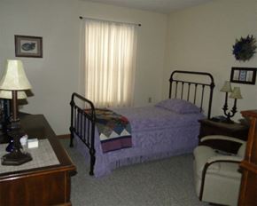 Red Wing apartment for rent - a bedroom with a bed and a dresser