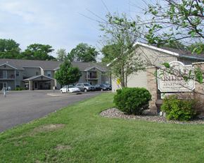 Red Wing apartment for rent - a view of the parking lot and entrance to the heights apartments