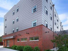 Philadelphia apartment for rent - a brick building with a silver building on top of it