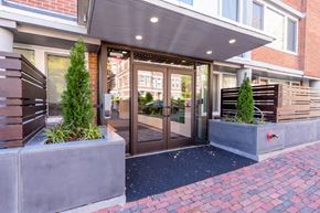 Cambridge apartment for rent - the front entrance of a building with glass doors