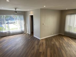 Los Angeles apartment for rent - a living room with wood flooring and a large window
