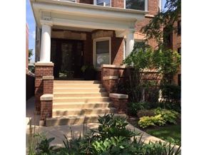 Chicago apartment for rent - a brick house with steps and a front porch