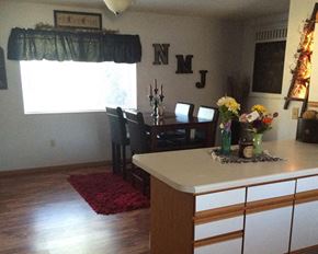 Jackson townhouse for rent - a kitchen and dining room with a table and chairs