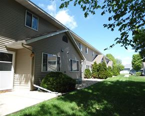 Jackson townhouse for rent - a house with a yard in front of it