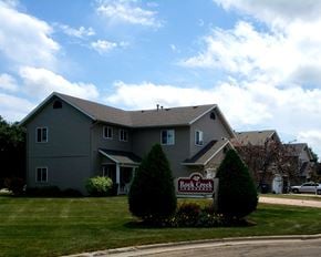 Luverne townhouse for rent - a house with a rock creek sign in front of it