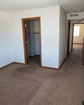 Luverne townhouse for rent - the view from the living room into the bedroom and the hallway to the bathroom