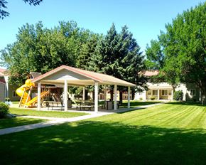 Luverne townhouse for rent - a park with a playground and a pavilion