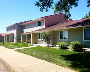 Luverne townhouse for rent - a house with a sidewalk in front of it