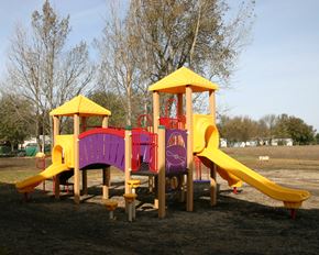 Worthington apartment for rent - a colorful playground with a slide and other playset