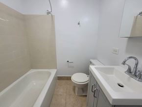 Chicago apartment for rent - a bathroom with a sink toilet and a bath tub