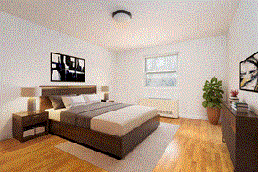 Roslyn apartment for rent - a bedroom with white walls and wood floors and a bed