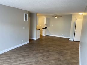 Los Angeles apartment for rent - a living room with a wood floor and a ceiling fan