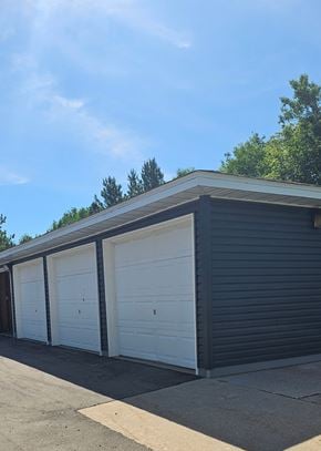 Clearbrook apartment for rent - A row of garage doors are closed.