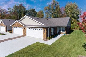 Altoona apartment for rent - A house with a driveway and a garage.