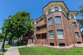 Evanston apartment for rent - a brick apartment building with a sidewalk in front of it