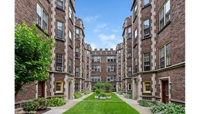 Evanston apartment for rent - a view of the courtyard of a large brick building