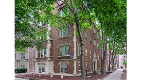 Evanston apartment for rent - a brick building with trees in front of it