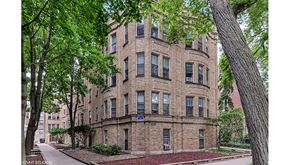Evanston apartment for rent - a brick building with trees in front of it