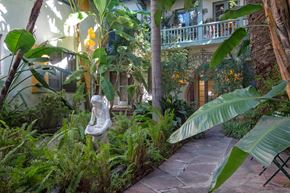 Los Angeles apartment for rent - a courtyard with plants and a statue