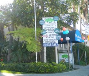 South Gate apartment for rent - a bunch of signs in front of a building