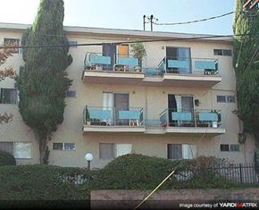 La Habra apartment for rent - an apartment building with blue balconies and windows