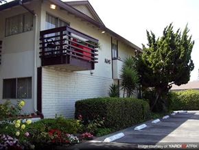 Bellflower apartment for rent - a building with a balcony on the side of it