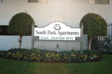 Anaheim apartment for rent - a sign apartments in front of a building
