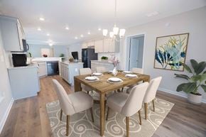 Newark apartment for rent - a dining room and kitchen with a table and chairs