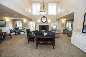 Franklin apartment for rent - a large living room with a fireplace and a table