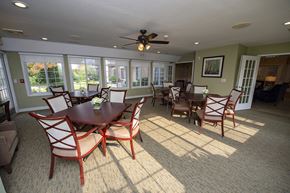 Franklin apartment for rent - a dining room with a table and chairs and a ceiling fan